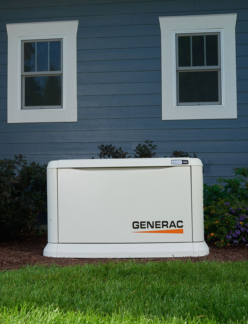 generac generator outside blue house